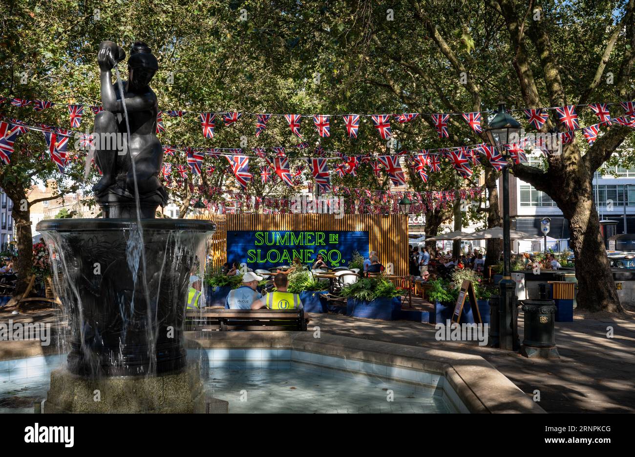 London, UK Sloane Square in Chelsea, London. An open air bar in the