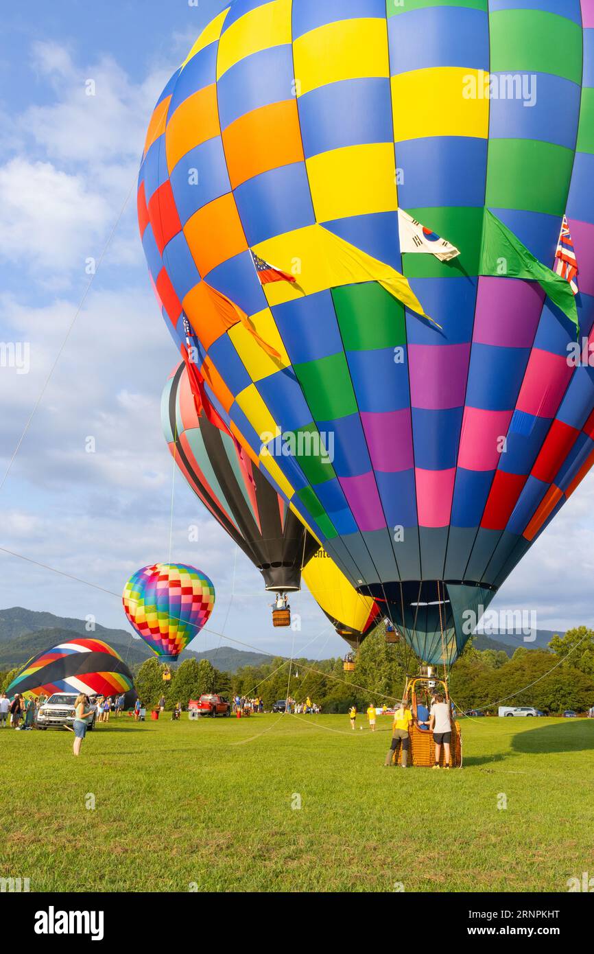 Balloon Rides Up hot air balloons being set up and tethered for rides Stock Photo - Alamy