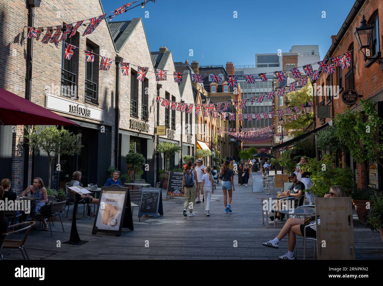 London, UK: Pavilion Road near Sloane Square in Chelsea, London. A pedestrian street with people enjoying the shops, cafes and restaurants. Stock Photo