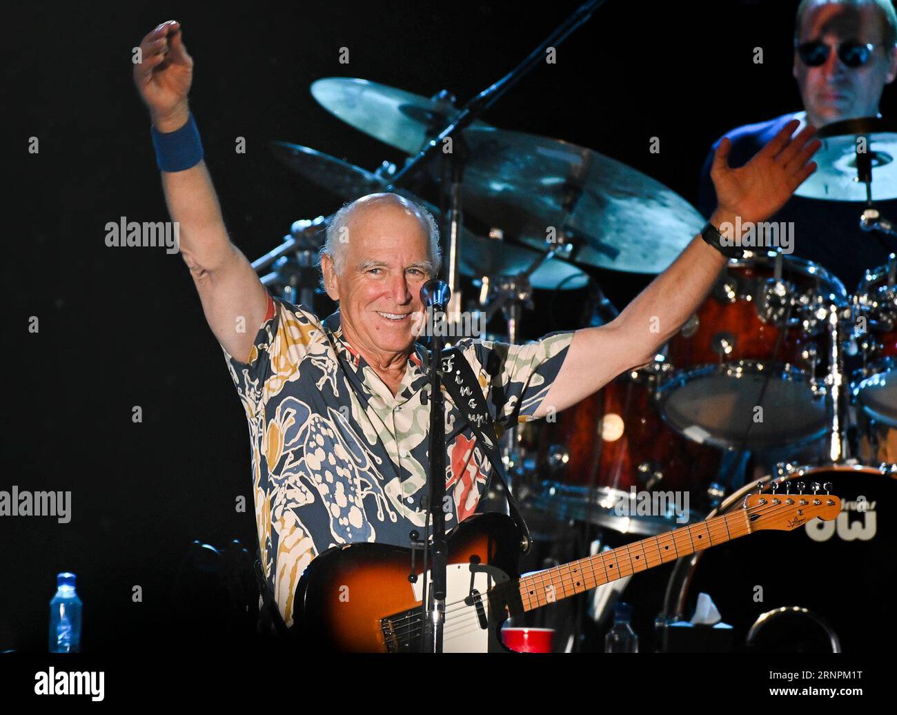 https://c8.alamy.com/comp/2RNPM1T/file-jimmy-buffett-thanks-the-capacity-crowd-at-the-coffee-butler-amphitheater-on-feb-9-2023-during-a-string-of-four-shows-in-key-west-fla-buffett-who-popularized-beach-bum-soft-rock-with-the-escapist-caribbean-flavored-song-margaritaville-and-turned-that-celebration-of-loafing-into-an-empire-of-restaurants-resorts-and-frozen-concoctions-has-died-friday-sept-1-2023-rob-oneal-the-key-west-citizen-via-ap-2RNPM1T.jpg