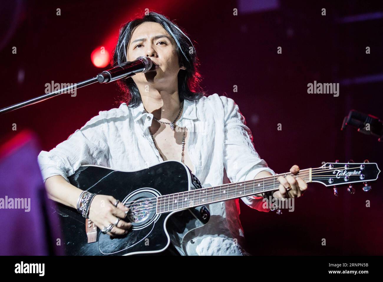 (170903) -- BEIJING, Sept. 3, 2017 -- Zhang Qi, leading singer of Chinese Rock n Roll band Black Panther, performs during their concert True Color in Beijing, capital of China, Sept. 2, 2017. ) (lfj) CHINA-BEIJING-BLACK PANTHER BAND-CONCERT (CN) YanxMin PUBLICATIONxNOTxINxCHN   Beijing Sept 3 2017 Zhang Qi Leading Singer of Chinese Rock n Roll Tie Black Panther performs during their Concert True Color in Beijing Capital of China Sept 2 2017 lfj China Beijing Black Panther Tie Concert CN  PUBLICATIONxNOTxINxCHN Stock Photo