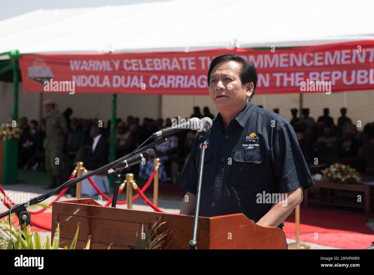 (170908) -- CHISAMBA (ZAMBIA), Sept. 8, 2017 -- Xu Guojian, the president of China Jiangxi Corporation for International Economic and Technical Cooperation (CJIC), delivers a speech during a commencement ceremony of China-funded mega-road project in Chisamba district, central Zambia, on Sept. 8, 2017. Zambia on Friday launched construction of the China-funded mega-road project that connects the southern and central parts of the country to the mining towns in the Copperbelt province. The construction of the 321-kilometer Lusaka-Ndola dual carriageway, including the bypass roads in Kabwe and Kap Stock Photo