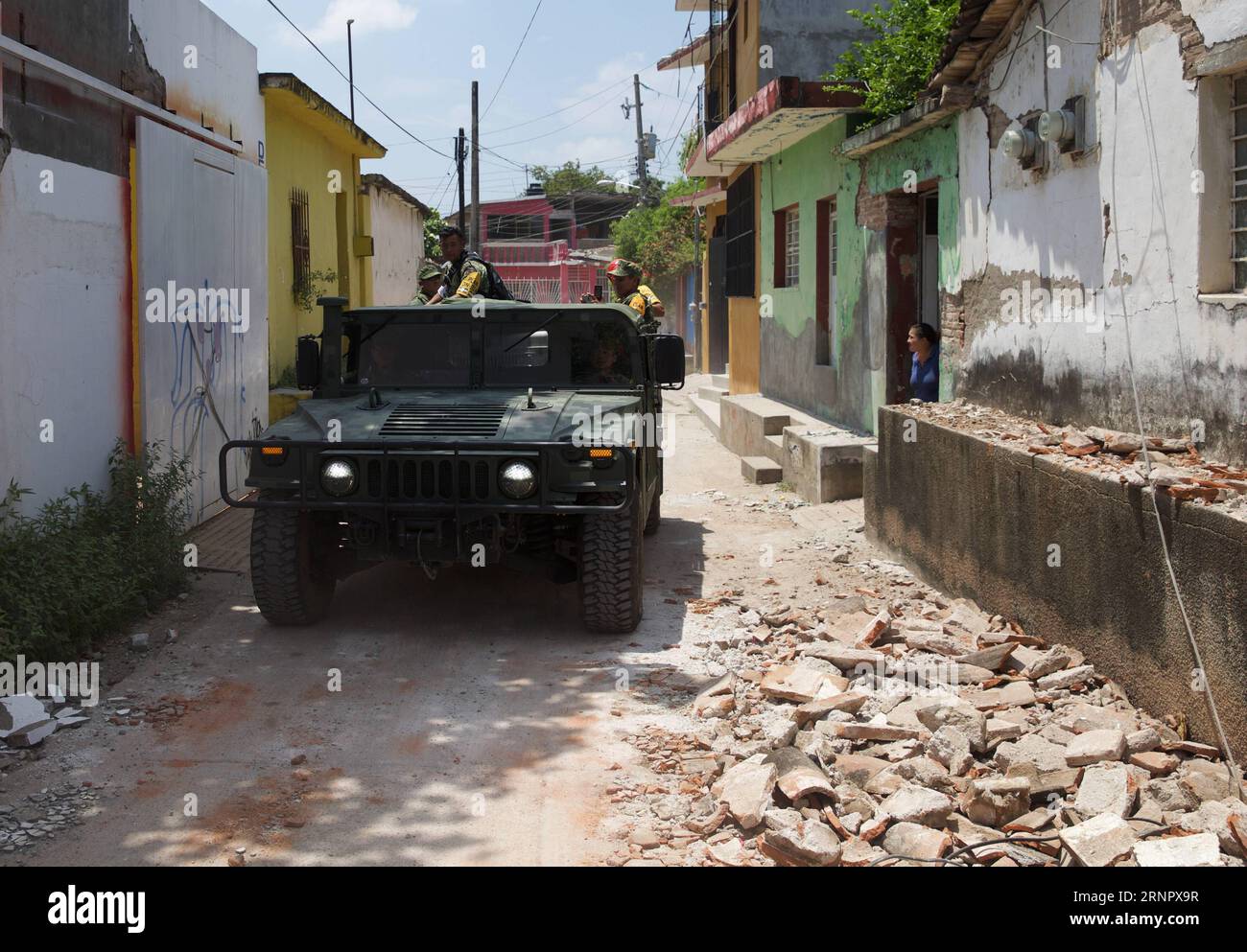 (170910) -- JUCHITAN (MEXICO), Sept. 10, 2017 -- A military vehicle inspects a street after an earthquake hit in Juchitan, Oaxaca state, Mexico, Sept. 9, 2017. A powerful earthquake measuring 8.2 on the Richter scale struck off Mexico s southern coast late Thursday night, killing 90 people. ) MEXICO-OAXACA-JUCHITAN-EARTHQUAKE DanxHang PUBLICATIONxNOTxINxCHN Stock Photo
