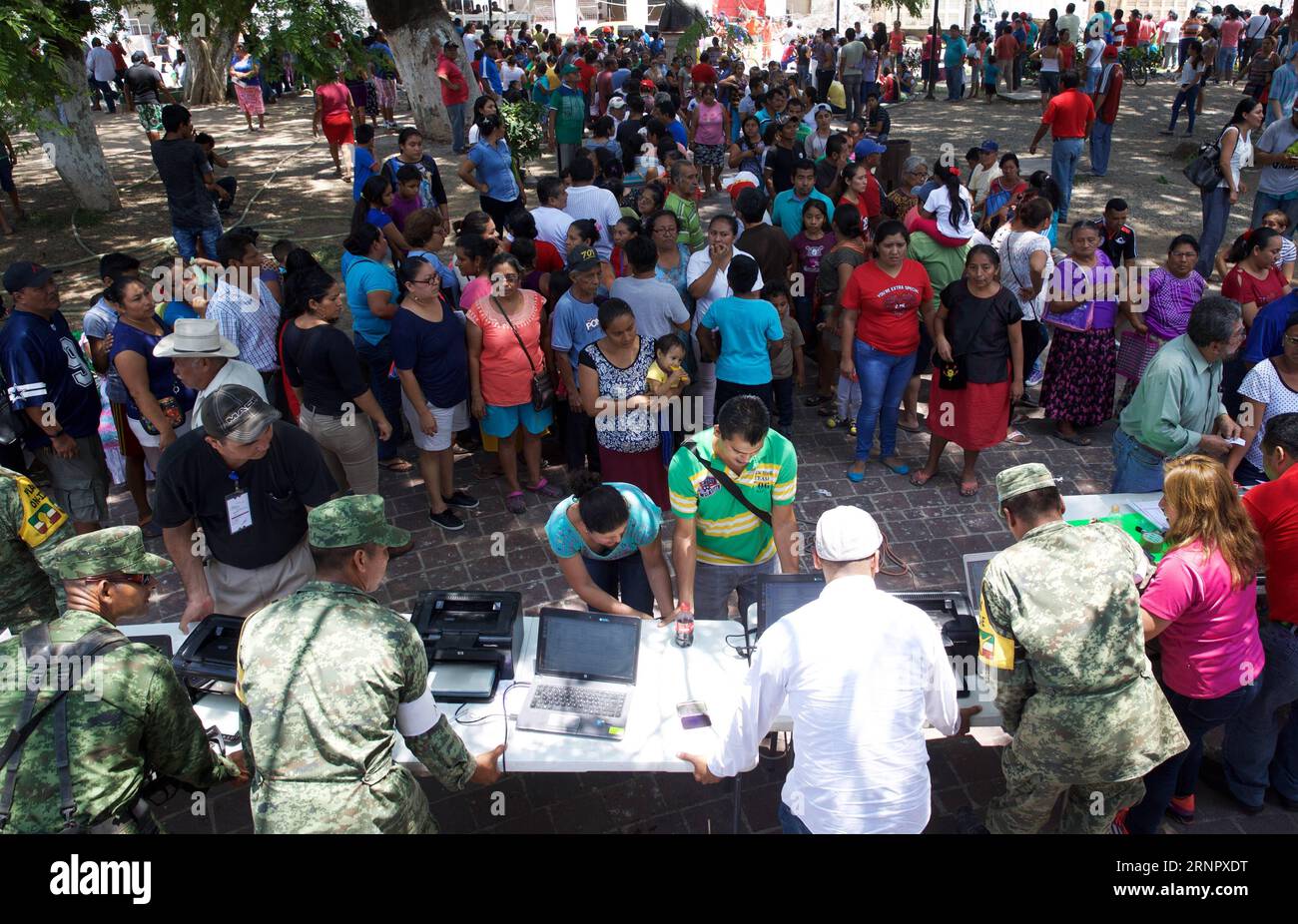 (170910) -- JUCHITAN (MEXICO), Sept. 10, 2017 -- Local residents register the loss of property to the authority after an earthquake hit in Juchitan, Oaxaca state, Mexico, Sept. 9, 2017. A powerful earthquake measuring 8.2 on the Richter scale struck off Mexico s southern coast late Thursday night, killing 90 people. ) MEXICO-OAXACA-JUCHITAN-EARTHQUAKE DanxHang PUBLICATIONxNOTxINxCHN Stock Photo