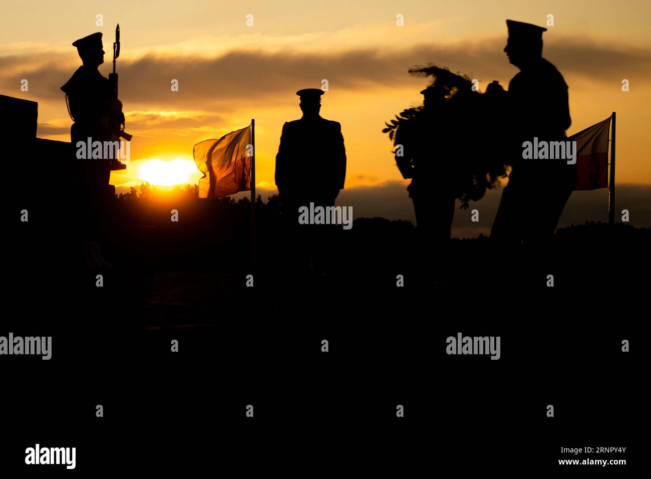 Gdansk, Poland. 1st Sep, 2023. Silhouette of soldiers during the 84th anniversary of the outbreak of World War II in Westerplatte. On the 84th anniversary of the outbreak of World War II, people in Poland gathered in Westerplatte to remember and pay tribute to those who were killed and abused during one of the most terrible tragedies in world history. The Polish government organized the anniversary event to remind the people never to let World War happen again. (Credit Image: © Mateusz Slodkowski/SOPA Images via ZUMA Press Wire) EDITORIAL USAGE ONLY! Not for Commercial USAGE! Stock Photo