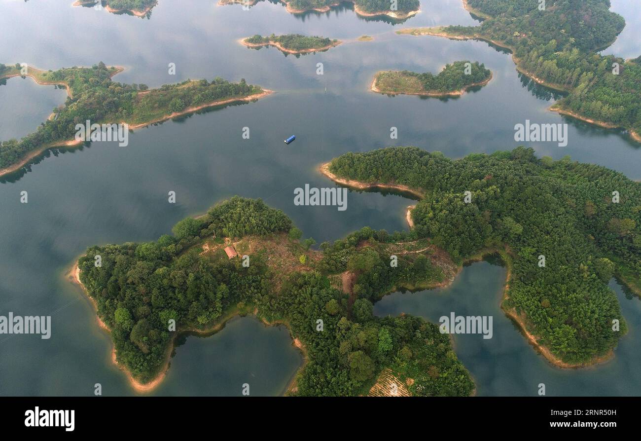 (170919) -- LU AN, Sept. 19, 2017 -- Aerial photo taken on Sept. 18, 2017 shows the beautiful scenery of Xianghongdian reservoir at Jinzhai County of Lu an City, east China s Anhui Province. The Xianghongdian reservoir was approved as the National Water Park in 2004. ) (yxb) CHINA-ANHUI-XIANGHONGDIAN RESERVOIR-SCENERY(CN) TaoxMing PUBLICATIONxNOTxINxCHN Stock Photo