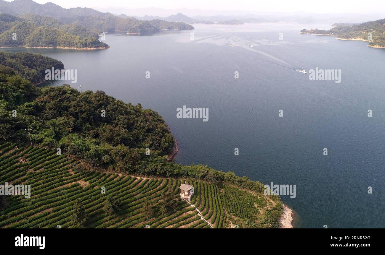 (170919) -- LU AN, Sept. 19, 2017 -- Aerial photo taken on Sept. 18, 2017 shows the beautiful scenery of Xianghongdian reservoir at Jinzhai County of Lu an City, east China s Anhui Province. The Xianghongdian reservoir was approved as the National Water Park in 2004. ) (yxb) CHINA-ANHUI-XIANGHONGDIAN RESERVOIR-SCENERY(CN) TaoxMing PUBLICATIONxNOTxINxCHN Stock Photo