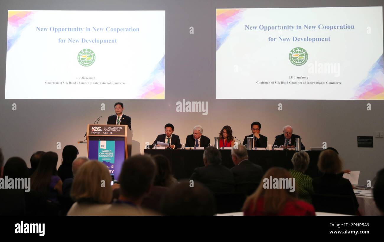 (170919) -- SYDNEY, Sept. 19, 2017 -- President of the Silk Road Chamber of International Commerce (SRCIC) Lu Jianzhong (1st L, back) speaks at the 10th World Chambers Congress in Sydney, Australia, Sept. 19, 2017. The 10th World Chambers Congress kicked off in Sydney on Tuesday, with some of the world s brightest minds on hand to discuss ways to transform the future of business and stoke the economy. ) (zcc) AUSTRALIA-SYDNEY-10TH WORLD CHBERS CONGRESS BaixXuefei PUBLICATIONxNOTxINxCHN Stock Photo