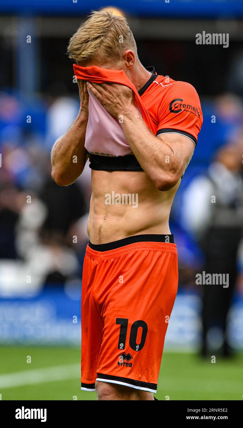 Wipes face with shirt hi-res stock photography and images - Alamy, image size:790x1390