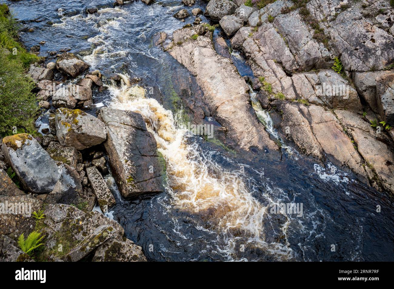 Landscape in Toss and Cromarty, highlands of Scotland with the Black Water River in the foreground Stock Photo