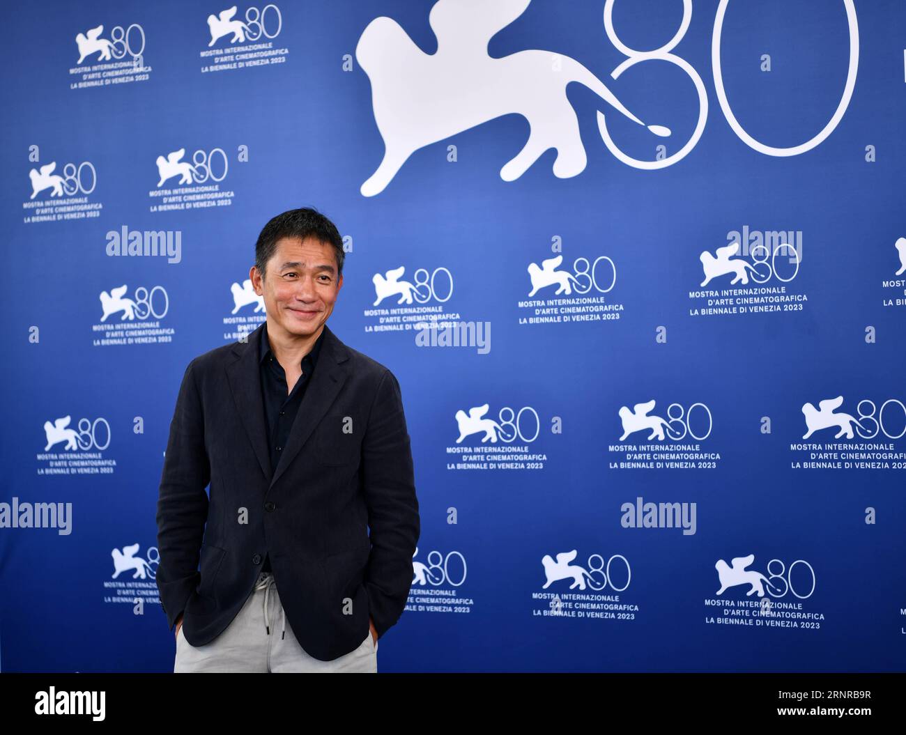 Venice, Italy. 2nd Sep, 2023. Actor Tony Leung Chiu-Wai attends a photocall during the 80th Venice International Film Festival in Venice, Italy, on Sept. 2, 2023. Tony Leung Chiu-Wai of Hong Kong, China was presented with the Golden Lion for Lifetime Achievement during the event on Saturday. Credit: Jin Mamengni/Xinhua/Alamy Live News Stock Photo