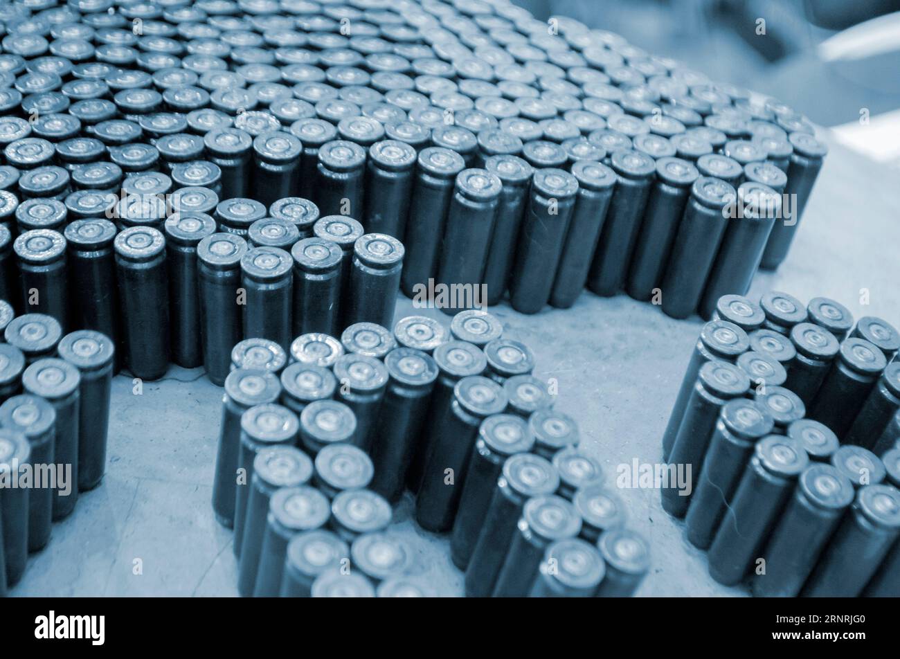 Object made up of spent used cartridge cases. Lots used shells 