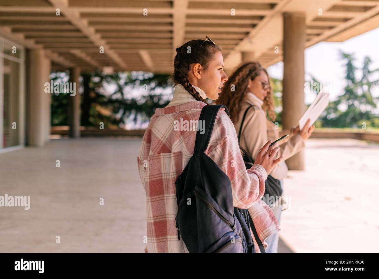 Girls wearing school bags hi-res stock photography and images - Alamy