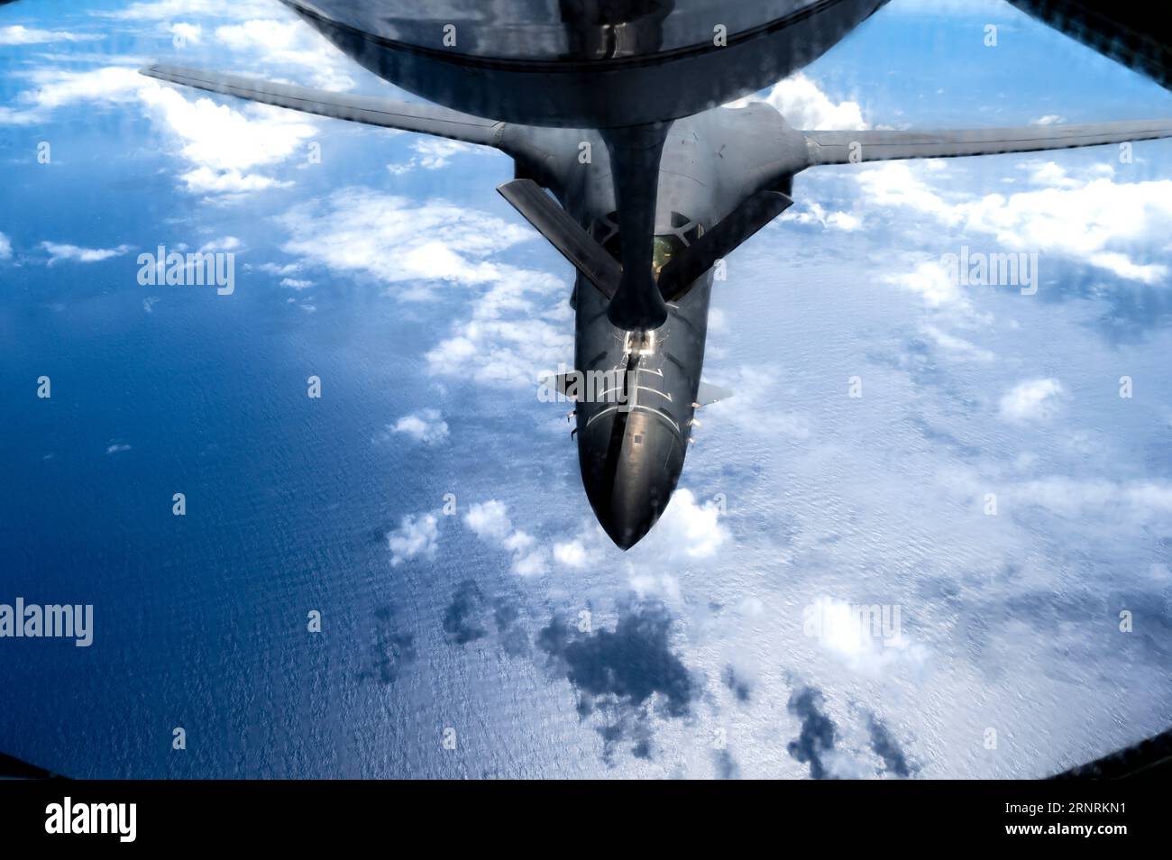 Sea of Japan, Japan. 30 August, 2023. U.S. Air Force B-1B Lancer stealth strategic bomber aircraft, with the 28th Bomb Wing, refuels from a KC-135 Stratotanker during a Japanese - United States joint exercise, August 30, 2023 over the Sea of Japan.  Credit: SSgt. Dwane Young/U.S. Air Force Photo/Alamy Live News Stock Photo