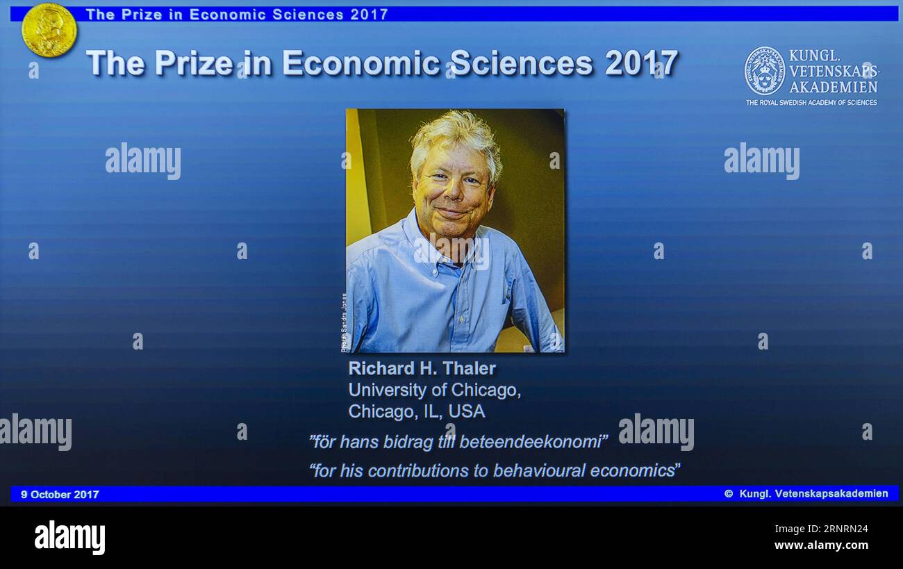(171009) -- STOCKHOLM, Oct. 9, 2017 -- Photo of Richard H. Thaler is displayed on the screen during the press conference to announce the winner of the 2017 Nobel Prize in Economics in Stockholm, Sweden, on Oct. 9, 2017. The 2017 Nobel Prize in Economics, or officially the Sveriges Riksbank Prize in Economic Sciences in Memory of Alfred Nobel, was awarded to Richard H. Thaler for his contributions to behavioural economics, announced the Royal Swedish Academy of Sciences here on Monday. )(dtf) SWEDEN-STOCKHOLM-NOBEL PRIZE-ECONOMICS ShixTiansheng PUBLICATIONxNOTxINxCHN Stock Photo