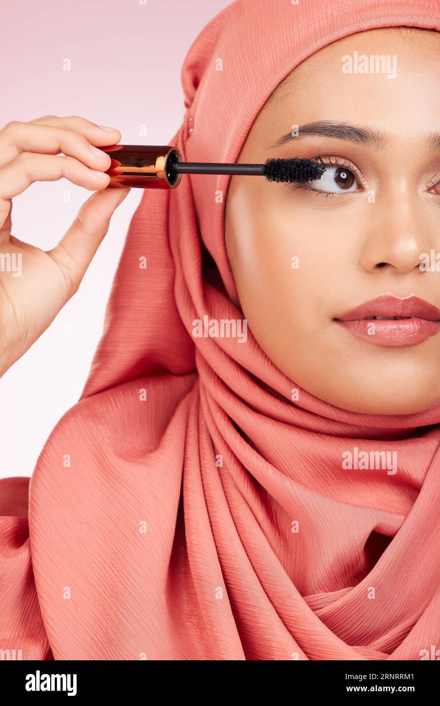 Beauty, luxury and mascara with a muslim woman closeup in studio on a 