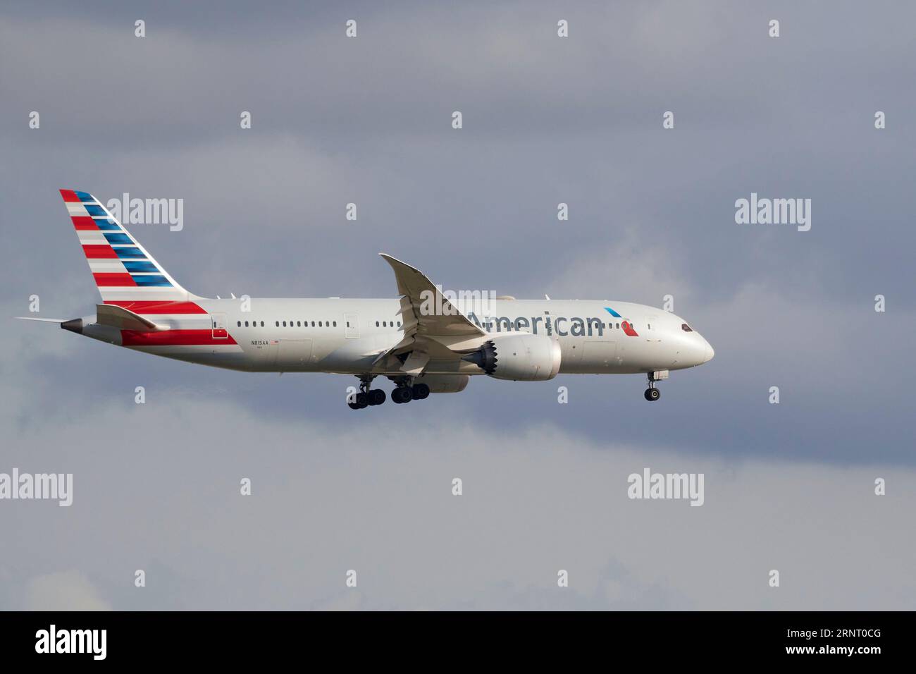 An American airlines company plane  landing at Barcelona airport, Un avión de la compañía American airlines aterrizando en el aeropuerto de Barcelona Stock Photo