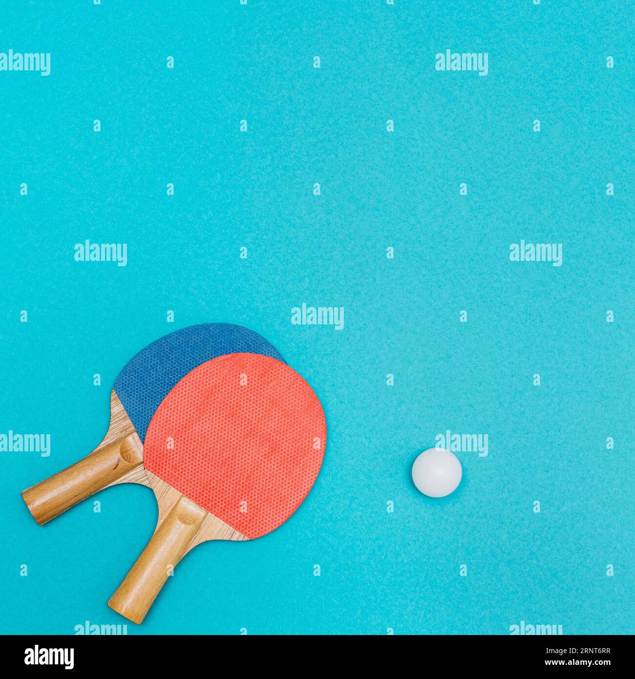 Two table tennis rackets with ball Stock Photo Alamy