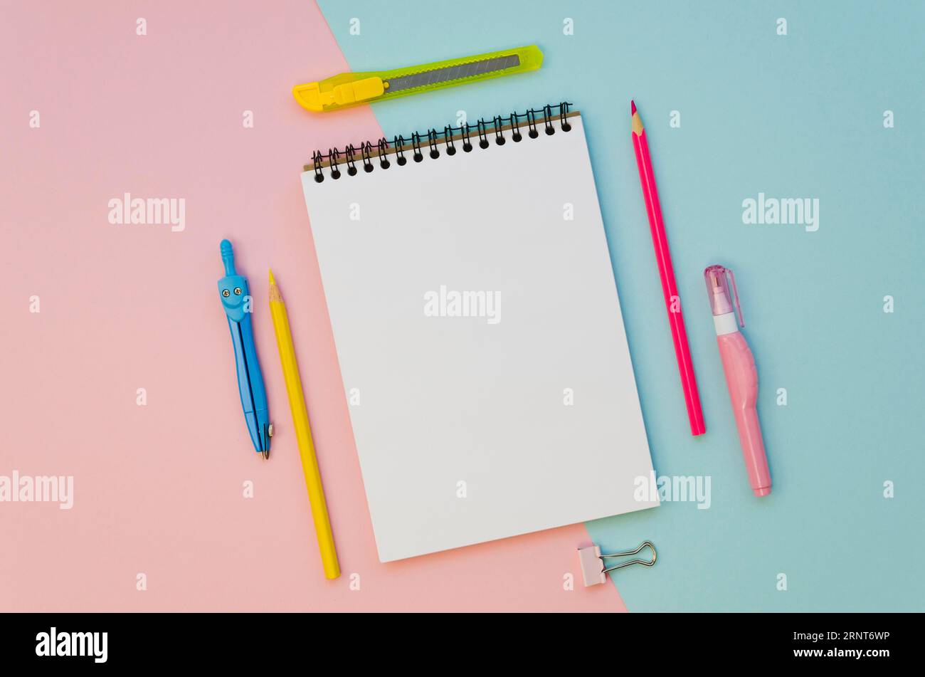 Top view notebook with colorful pens Stock Photo