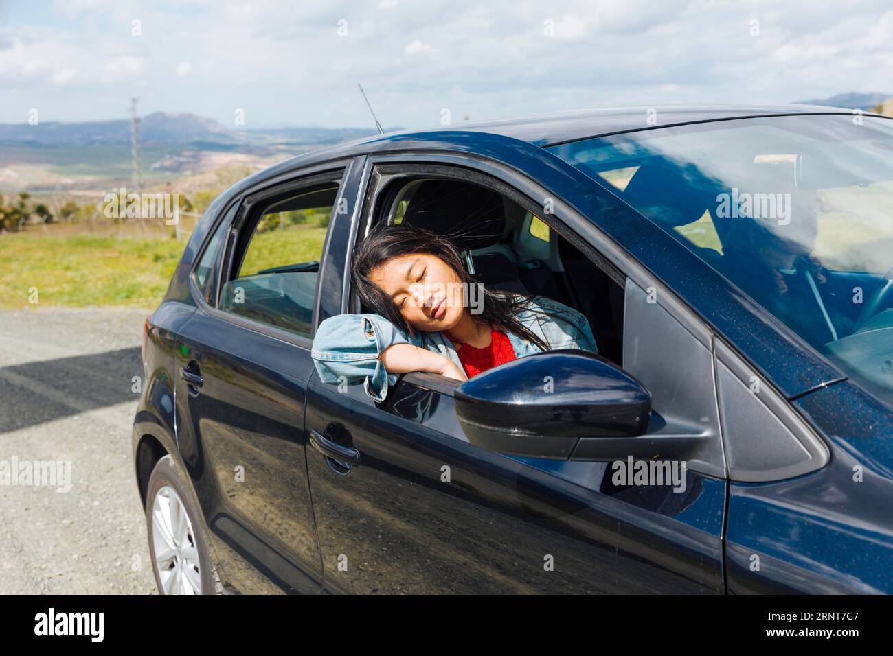 Asian female sleeping car Stock Photo