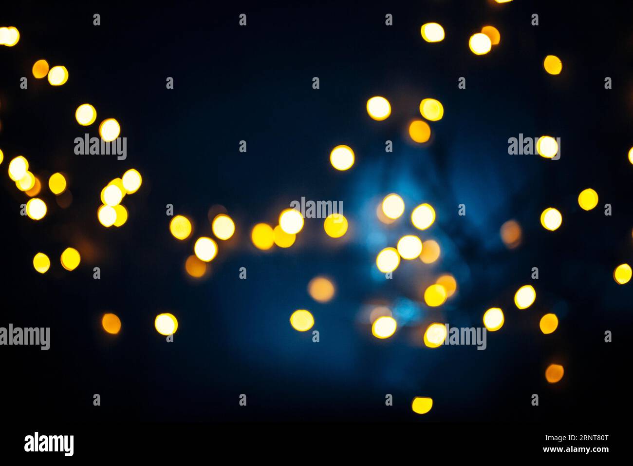 Bright lights dark blue background Stock Photo - Alamy
