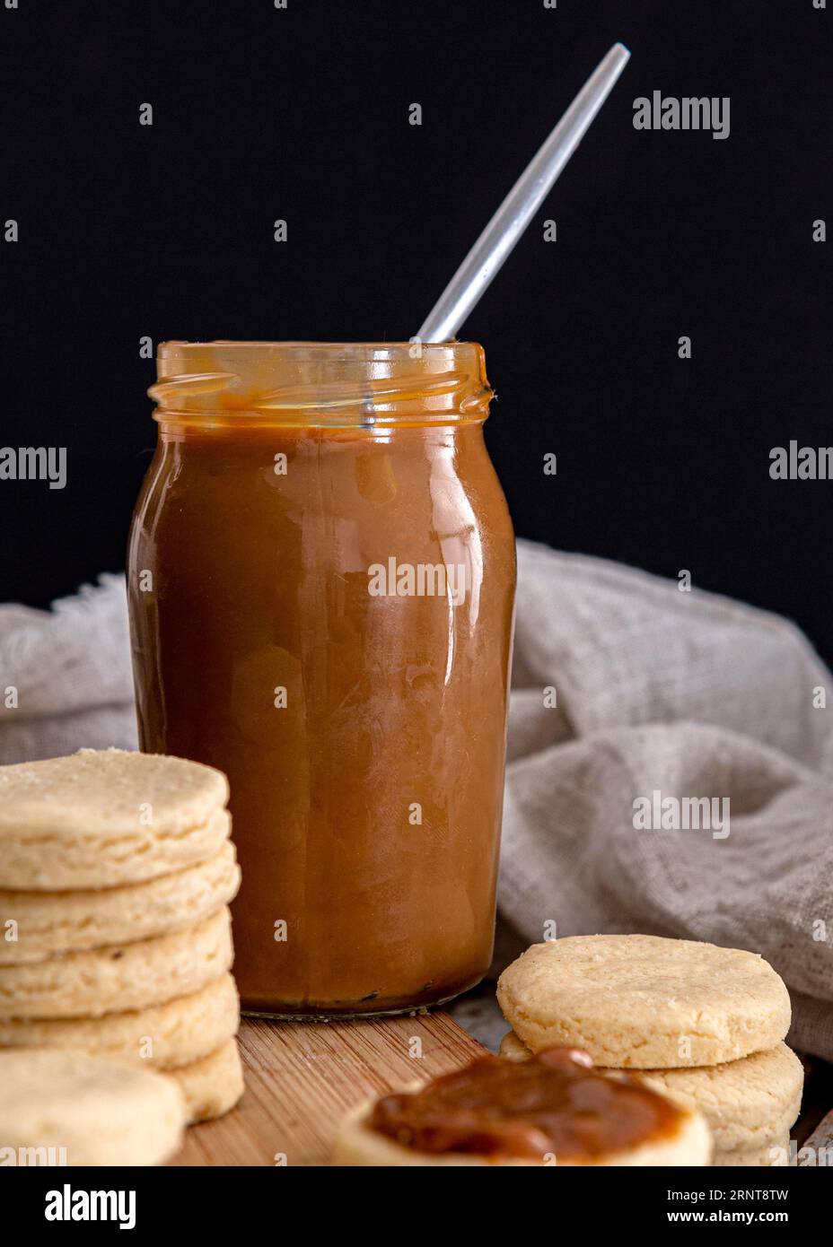Delicious dulche de leche jar concept Stock Photo