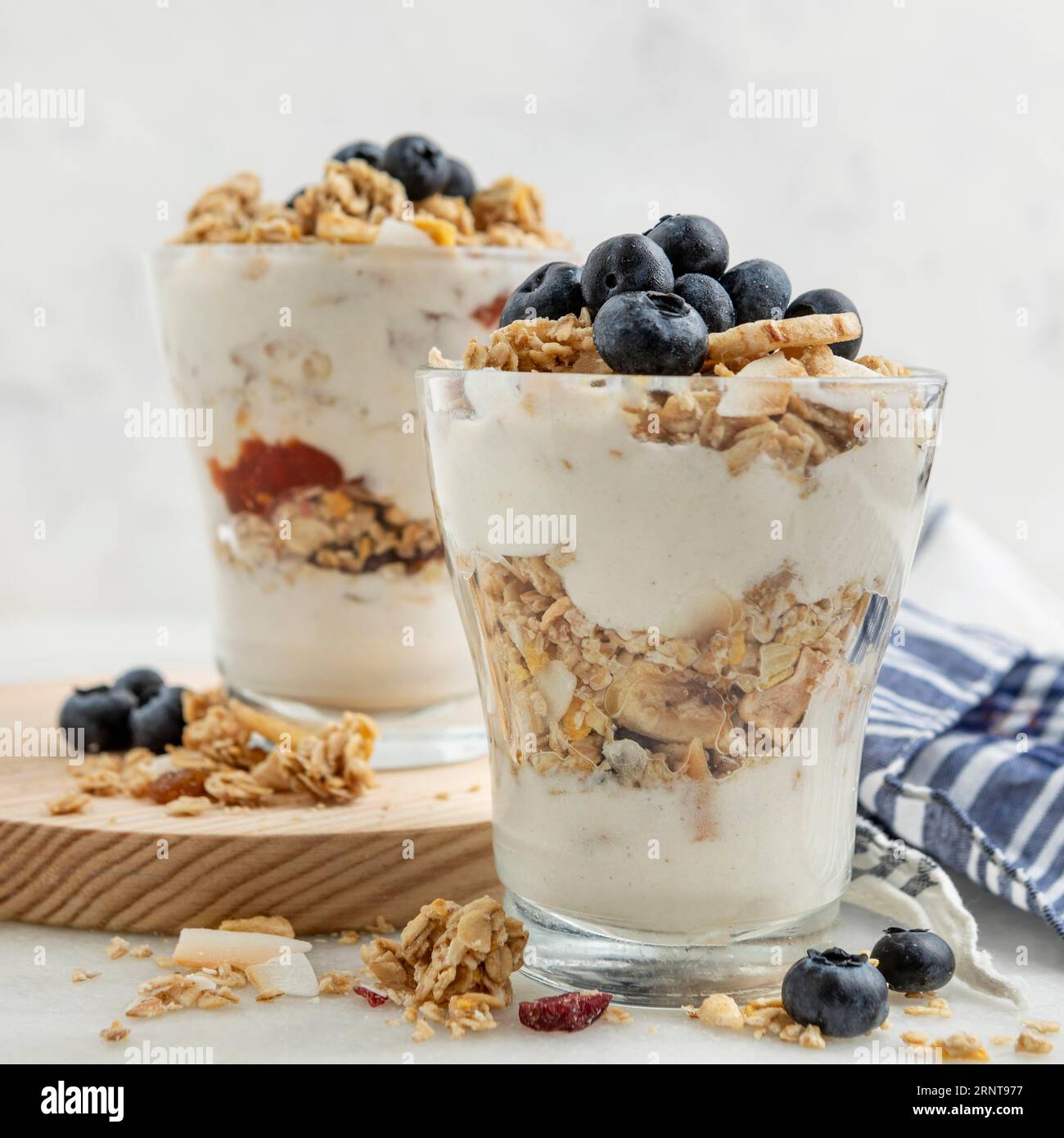 Front view glasses with yogurt breakfast cereals Stock Photo
