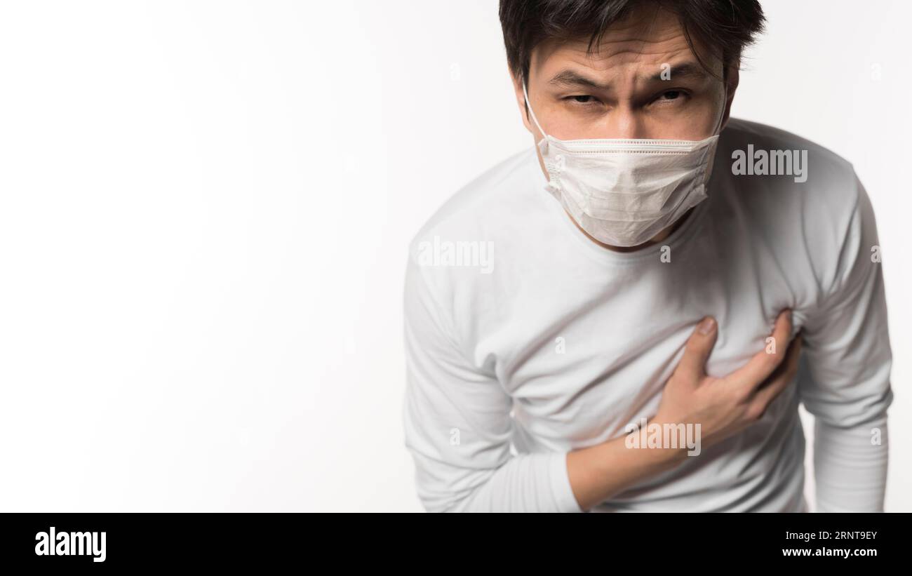 Front view sick man touching his chest pain Stock Photo