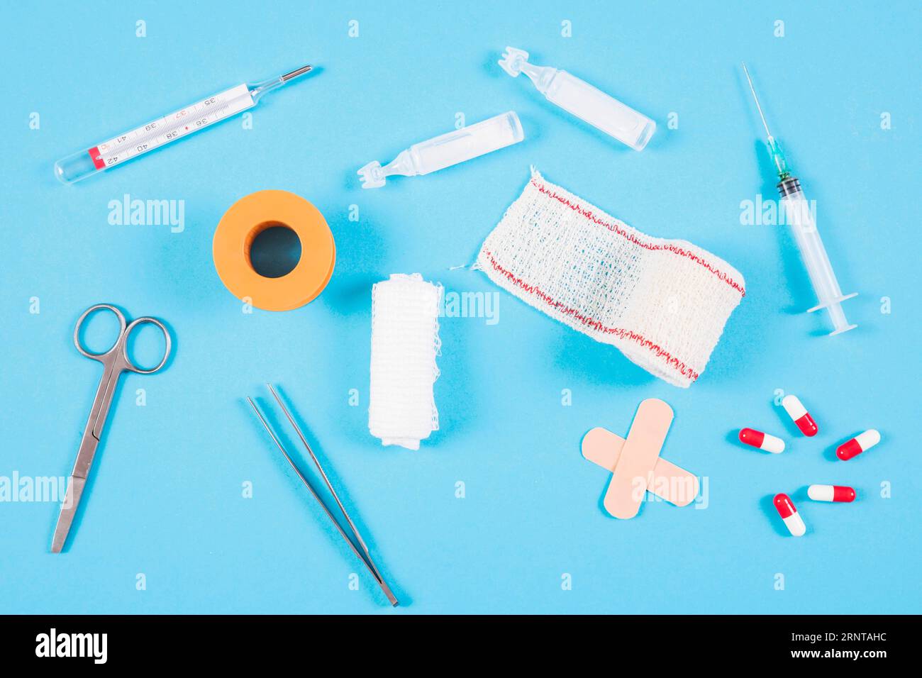Overhead view medical equipments blue backdrop Stock Photo Alamy