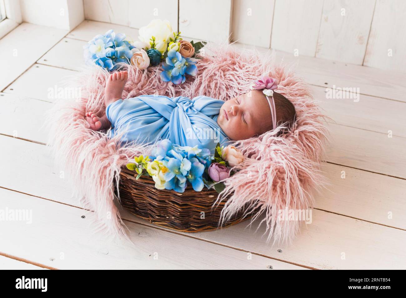 Small baby sleeping basket Stock Photo