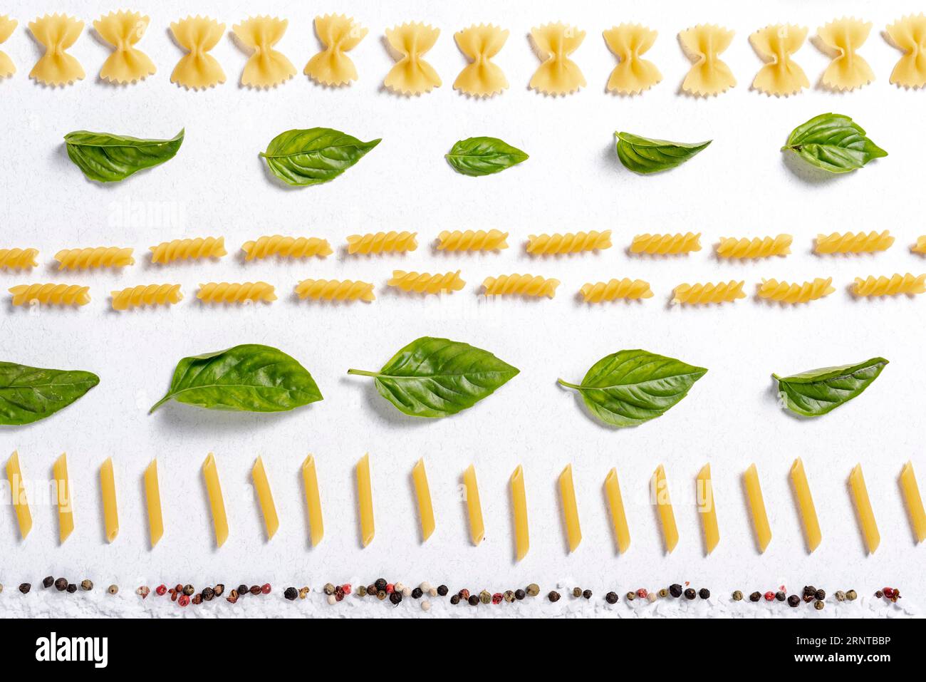 Top view fusilli farfalle penne pasta arrangement Stock Photo Alamy