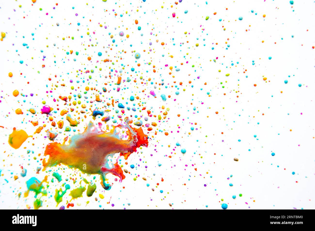 Vivid mix paint droplets white Stock Photo - Alamy