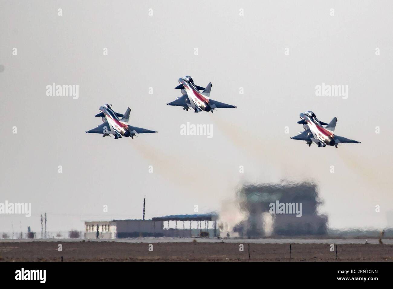 (171106) -- URUMQI, Nov. 6, 2017 -- Photo taken on Nov. 5, 2017 shows J-10 aerobatic fighter jets of the Chinese Air Force s August 1st Air Demonstration Team in China. The Chinese Air Force s August 1st Air Demonstration Team on Monday left for the United Arab Emirates (UAE) to take part in the Dubai Airshow, which is scheduled to last from Nov. 12-16. The team will also visit Pakistan after the airshow and stage aerobatic performances there on Nov. 20, according to the Chinese People s Liberation Army Air Force. )(mcg) CHINA-PLA-AIR DEMONSTRATION TEAM (CN*) Yangxpan PUBLICATIONxNOTxINxCHN Stock Photo