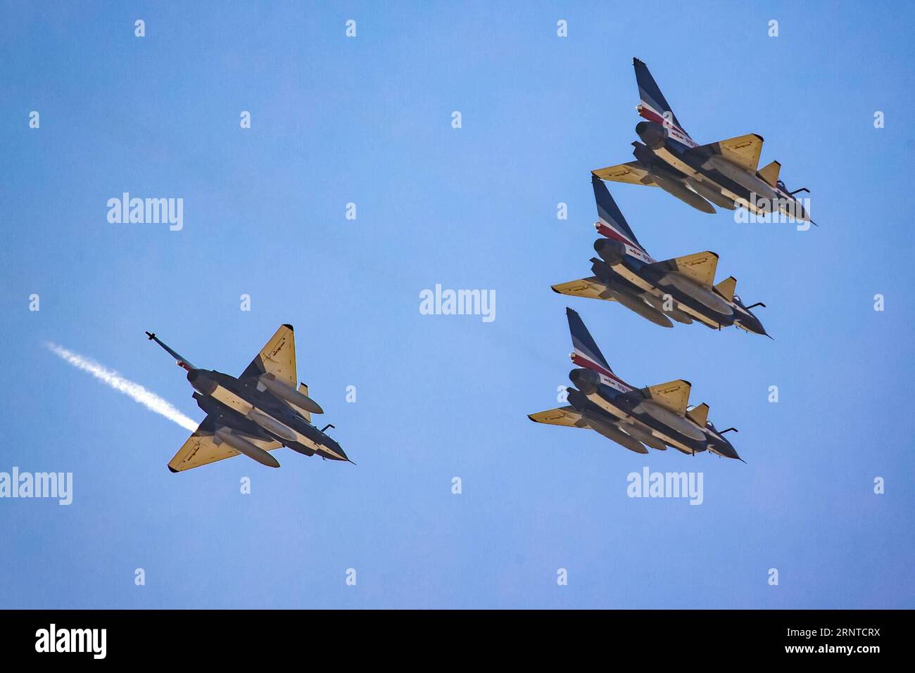 (171106) -- URUMQI, Nov. 6, 2017 -- Photo taken on Nov. 5, 2017 shows J-10 aerobatic fighter jets of the Chinese Air Force s August 1st Air Demonstration Team in China. The Chinese Air Force s August 1st Air Demonstration Team on Monday left for the United Arab Emirates (UAE) to take part in the Dubai Airshow, which is scheduled to last from Nov. 12-16. The team will also visit Pakistan after the airshow and stage aerobatic performances there on Nov. 20, according to the Chinese People s Liberation Army Air Force. )(mcg) CHINA-PLA-AIR DEMONSTRATION TEAM (CN*) Yangxpan PUBLICATIONxNOTxINxCHN Stock Photo