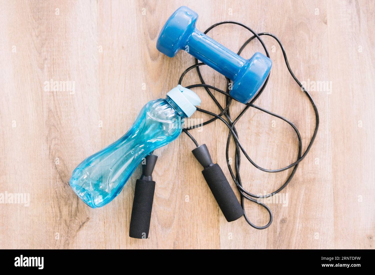 Dumbell jump rope bottle water Stock Photo Alamy
