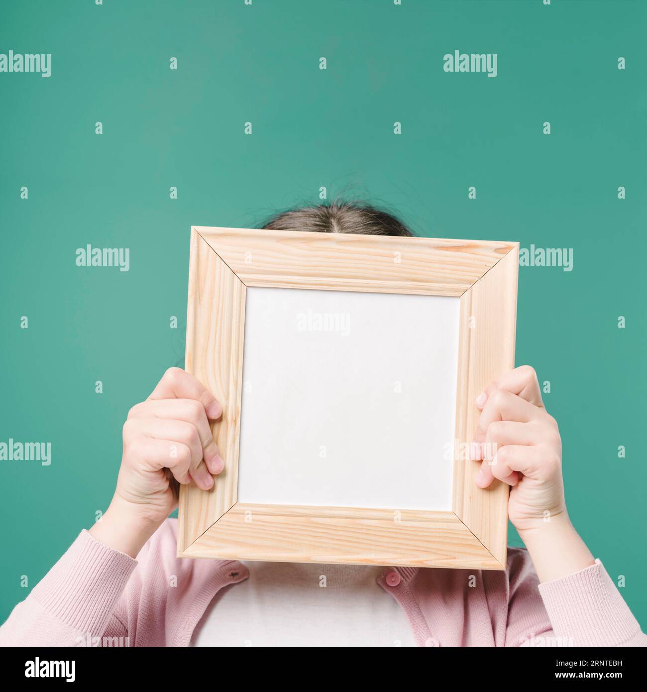 Hands holding picture frame Stock Photo - Alamy