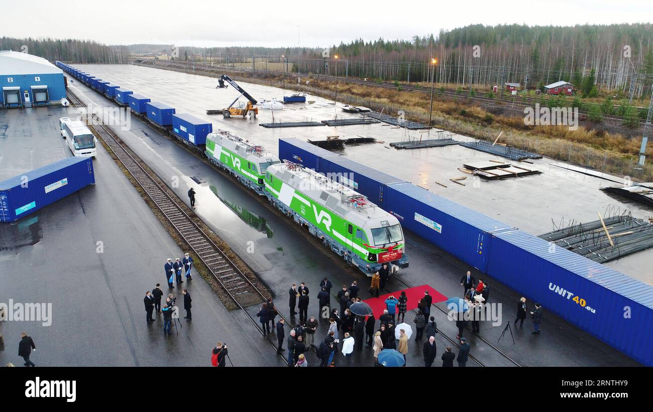 (171110) -- KOUVOLA (FINLAND), Nov. 10, 2017 -- The aerial photo taken on Nov. 10, 2017 shows the cargo train during a launching ceremony of the railway route in Kouvola, Finland. With more than 40 containers on it, the cargo train bound for Chinese inland city of Xi an departed Kouvola, southeastern Finland, on Friday. It will take 17 days to run 9,000 km to cross the Eurasia continent, passing through countries including Russia and Kazakhstan, before reaching its final destination of the northwest China s Xi an, one of the oldest cities in China. ) FINLAND-KOUVOLA-CHINA-CARGO TRAIN LixJizhi Stock Photo