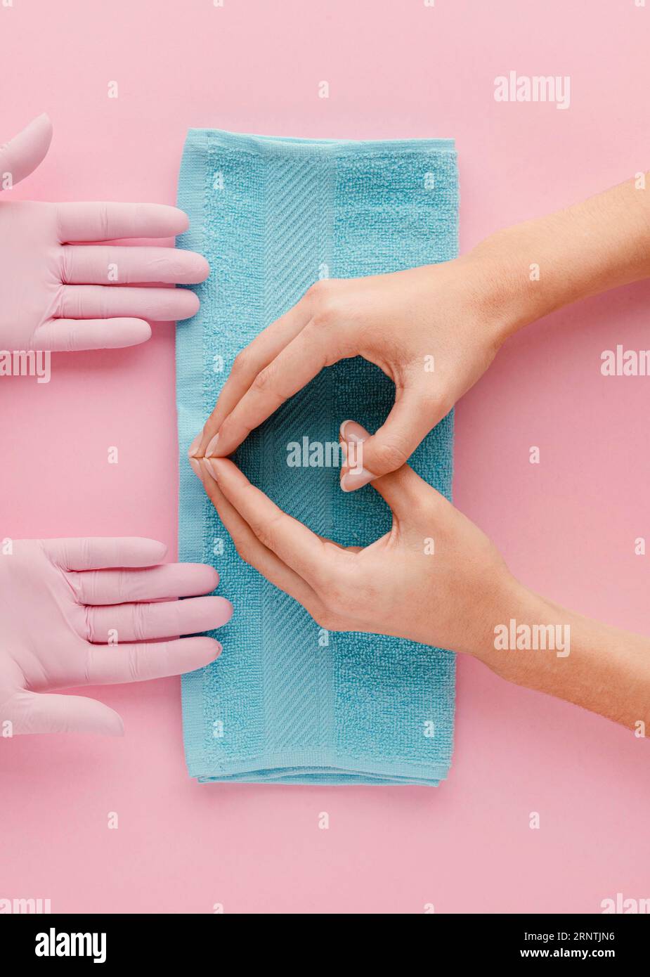 Blue towel face hands hi-res stock photography and images - Alamy
