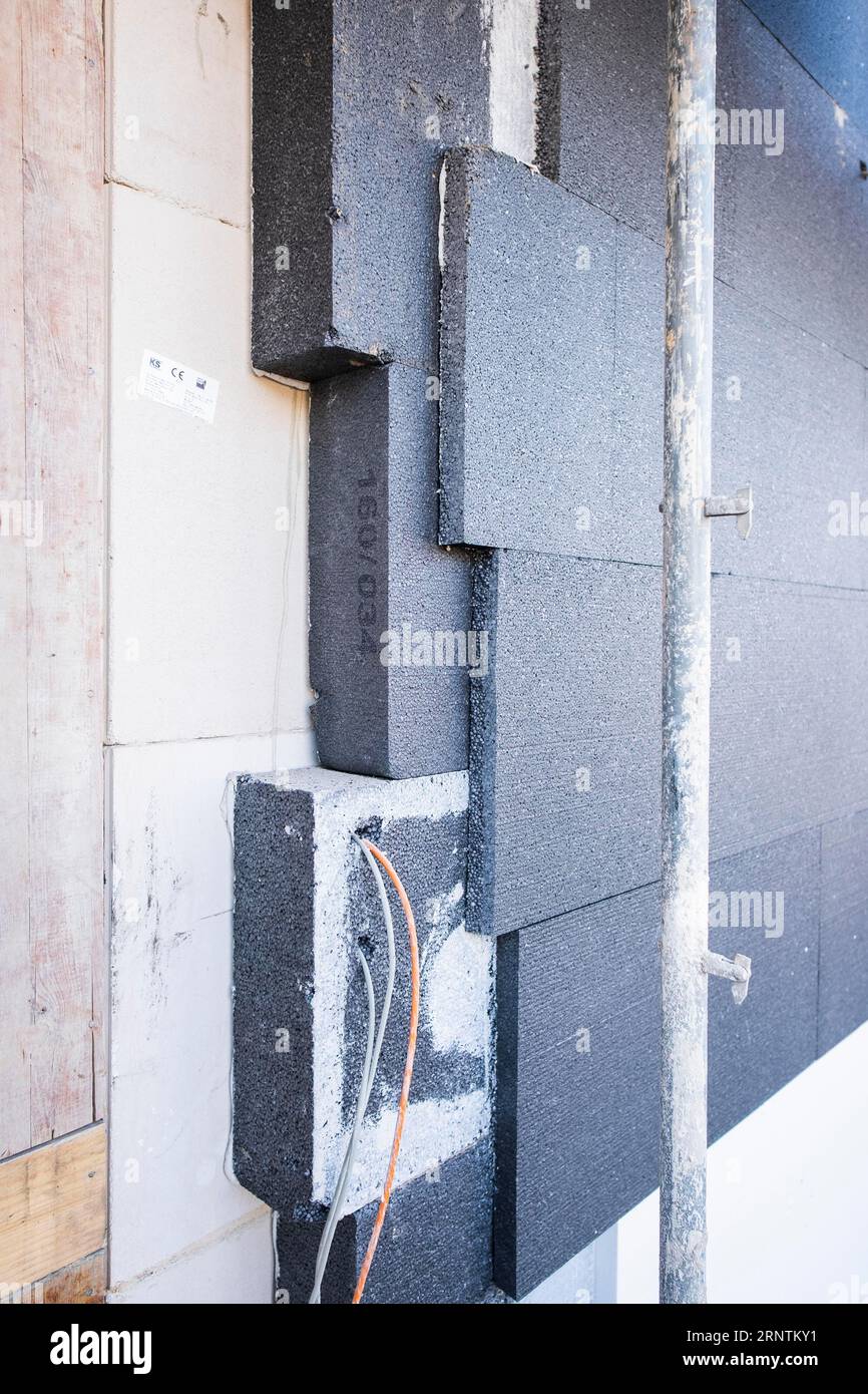 Insulation panels on a house facade of a new building Stock Photo - Alamy