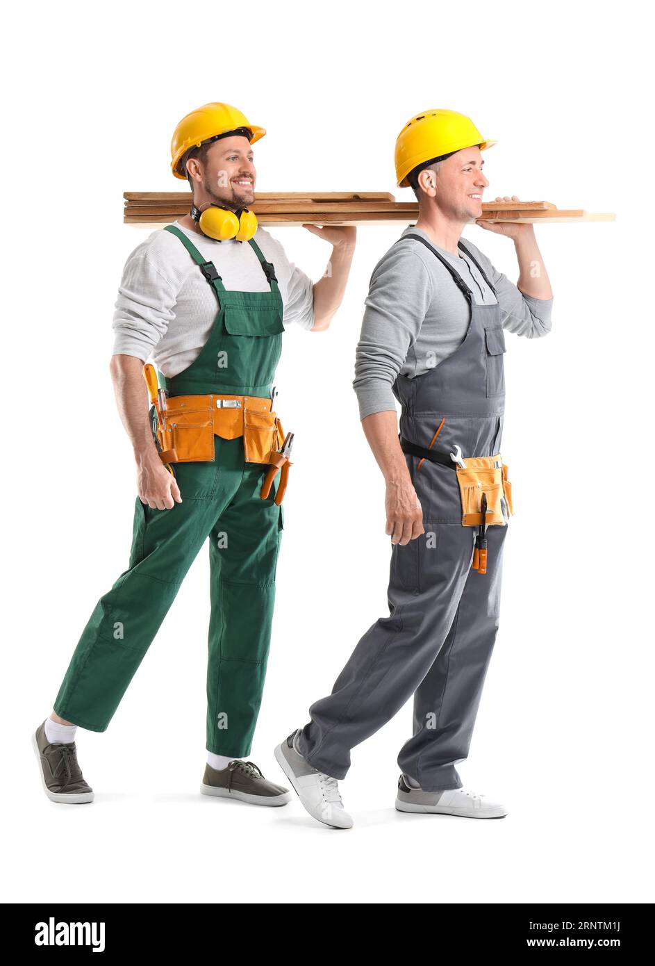 Male builders with wooden planks on white background Stock Photo - Alamy