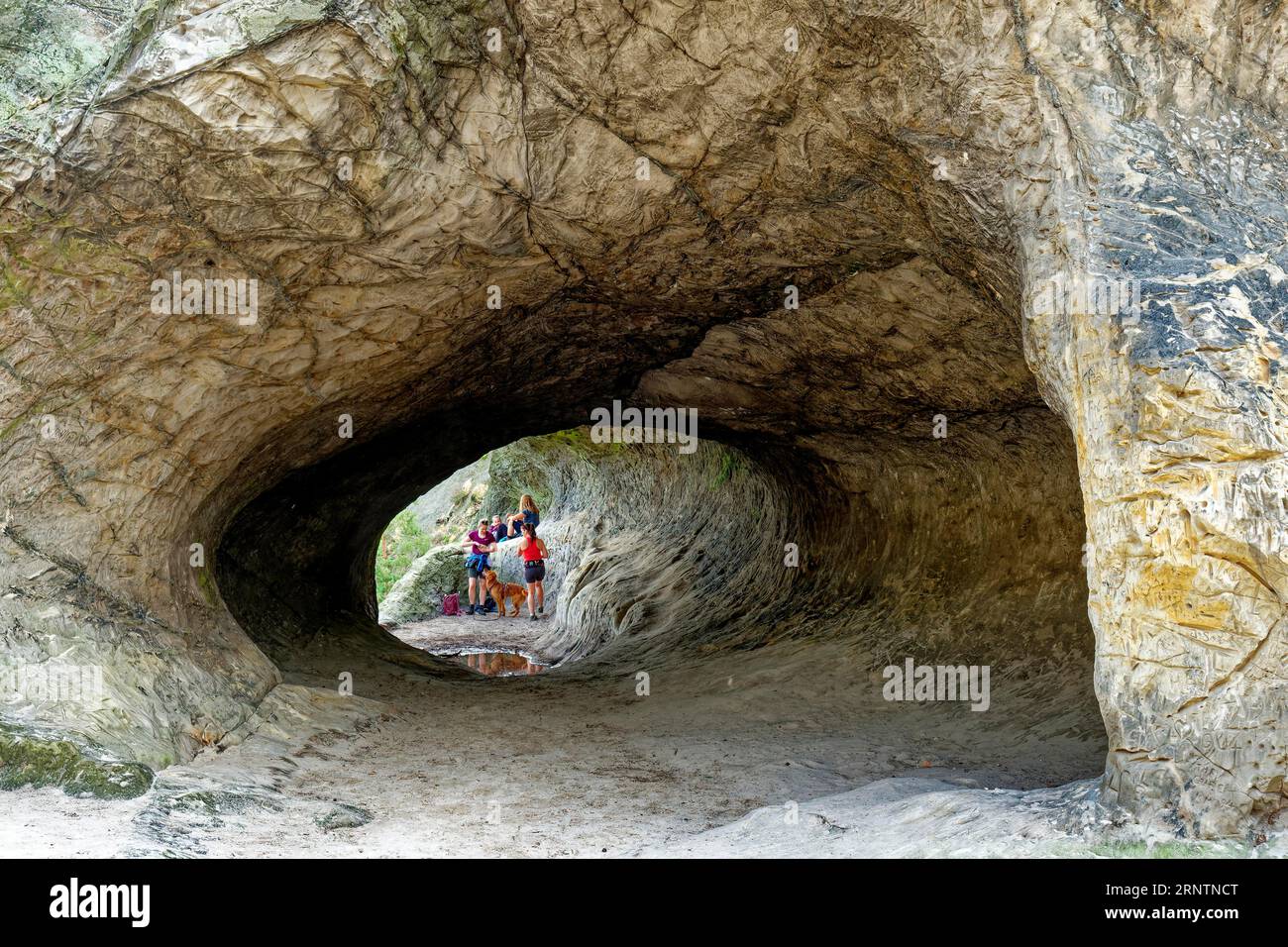 Stone tunnel at the rock formation Drei Zinnen, also called Hamburger
