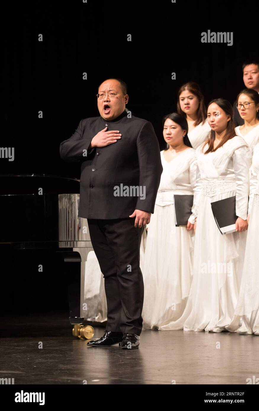 (171115) -- GENEVA, Nov. 15, 2017 -- Li Shuang (Front), tenor of China National Opera House, performs at a concert in Saint-Prex, a Swiss town near Lake Leman, on Nov. 15, 2017. China National Opera House held a performance here to promote cultural exchanges between China and Switzerland on Wednesday, attracting hundreds of locals and representatives of international organizations in Geneva. ) SWITZERLAND-SAINT-PREX-CHINA NATIONAL OPERA HOUSE-PERFORMANCE XuxJinquan PUBLICATIONxNOTxINxCHN Stock Photo