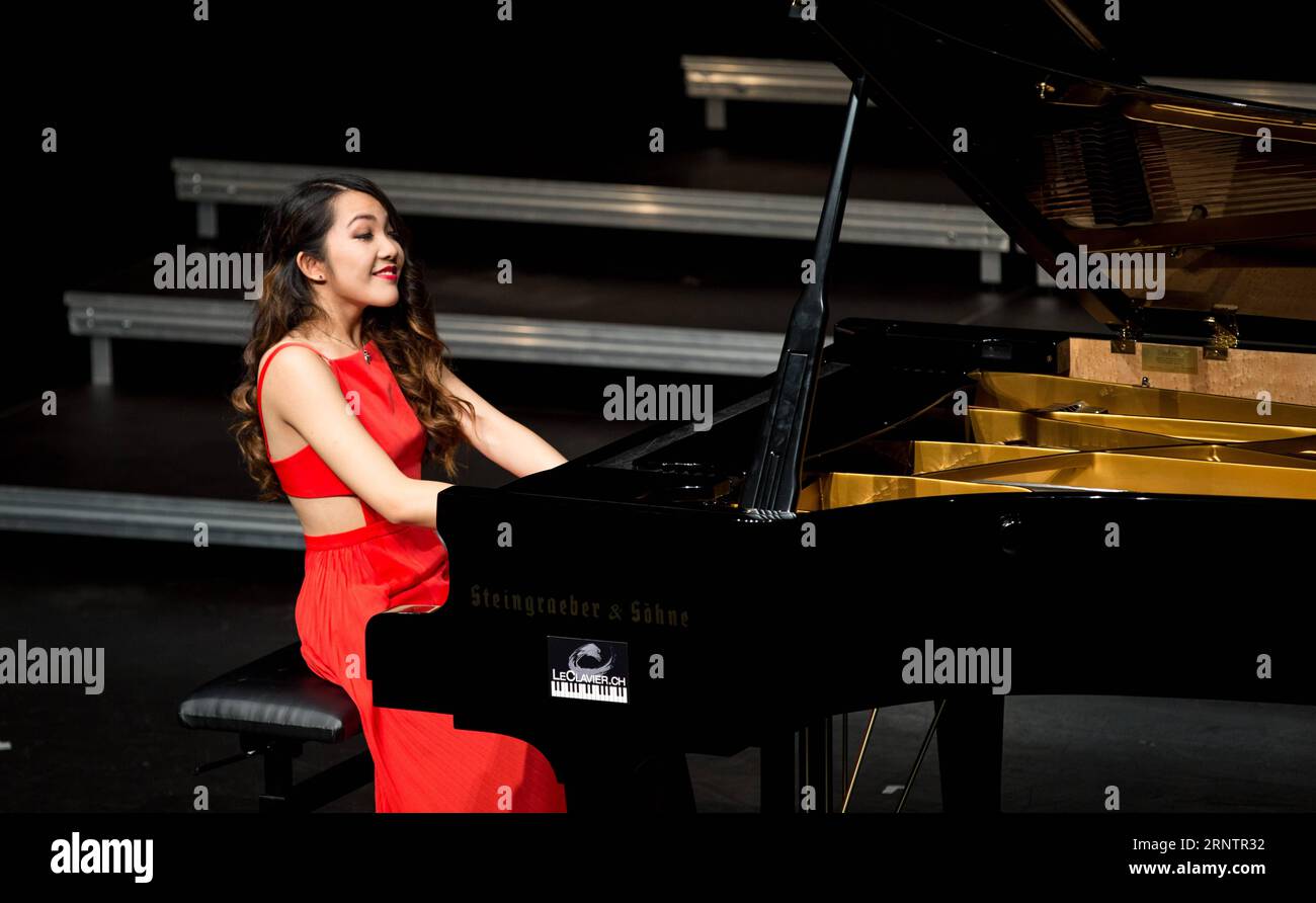 (171115) -- GENEVA, Nov. 15, 2017 -- Chinese Swiss pianist Melodie Zhao performs at a concert in Saint-Prex, a Swiss town near Lake Leman, on Nov. 15, 2017. China National Opera House held a performance here to promote cultural exchanges between China and Switzerland on Wednesday, attracting hundreds of locals and representatives of international organizations in Geneva. ) SWITZERLAND-SAINT-PREX-CHINA NATIONAL OPERA HOUSE-PERFORMANCE XuxJinquan PUBLICATIONxNOTxINxCHN Stock Photo