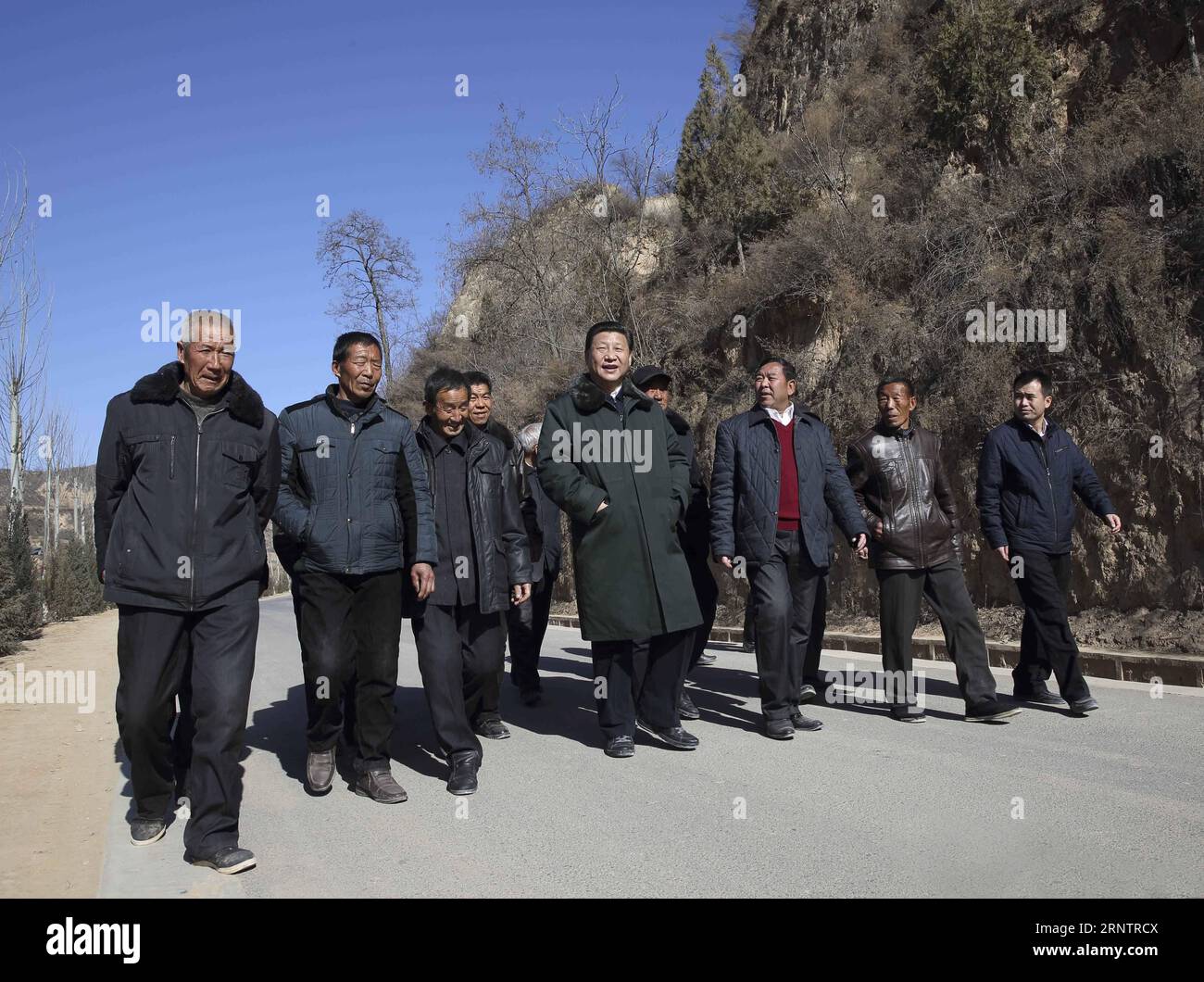 (171116) -- BEIJING, Nov. 16, 2017 () -- Xi Jinping visits people in Liangjiahe Village, Wen anyi Township of Yanchuan County, Yan an, northwest China s Shaanxi Province, Feb. 13, 2015. (/Lan Hongguang) To match Profile: Xi Jinping and his era CHINA-PROFILE: XI JINPING AND HIS ERA (CN) Xinhua PUBLICATIONxNOTxINxCHN Stock Photo