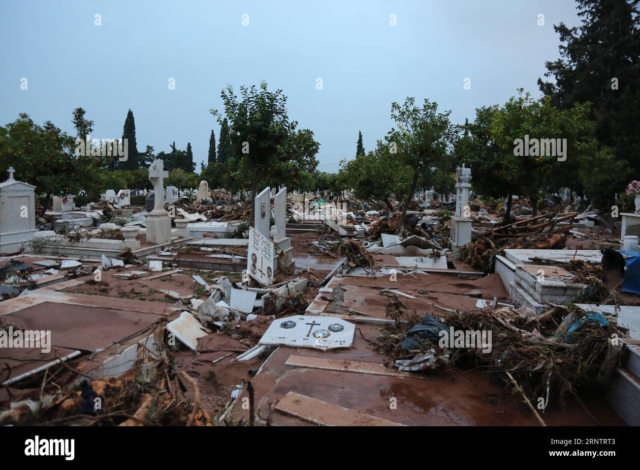 (171117) -- ATHENS, Nov. 17, 2017 -- Photo taken on Nov. 16, 2017 shows a damaged cemetery after the flash flooding in Mandra, Greece. The strong torrential downpour which turned roads into muddy rivers in the municipalities of Mandra, Nea Peramos and Megara, about 20 kilometers west of the Greek capital, has claimed 16 lives, according to the latest official count. )(swt) GREECE-ATHENS-FLOODING LefterisxPartsalis PUBLICATIONxNOTxINxCHN Stock Photo