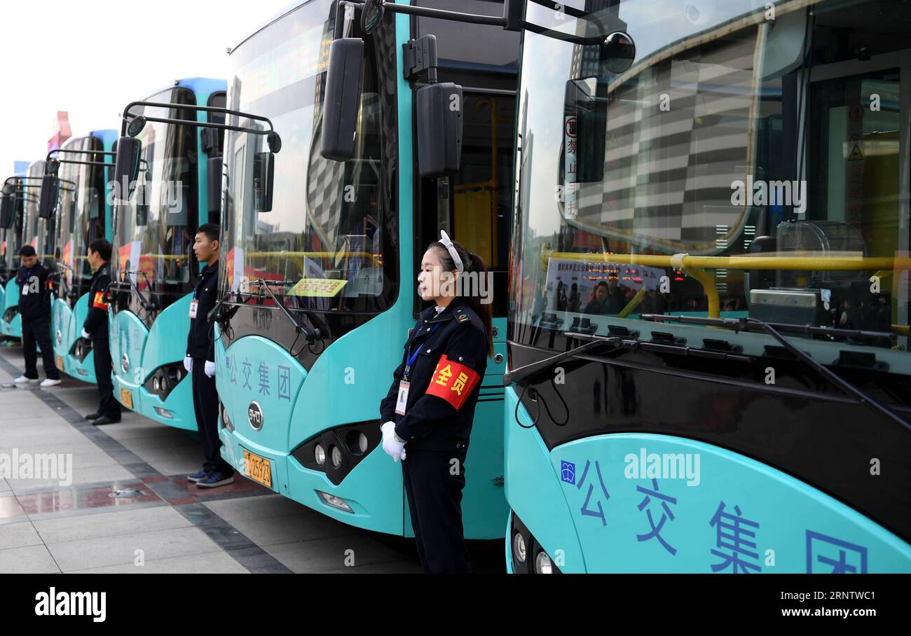 (171120) -- BENGBU, Nov. 20, 2017 -- Drivers stand in front of green energy buses in Bengbu, east China s Anhui Province, Nov. 20, 2017. So far, the city has introduced 783 green energy buses. )(mcg) CHINA-ANHUI-BENGBU-GREEN ENERGY BUS (CN) LiuxJunxi PUBLICATIONxNOTxINxCHN Stock Photo