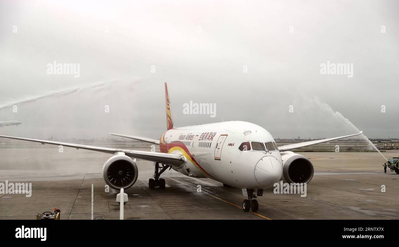 (171122) -- CHICAGO, Nov. 22, 2017 -- China s Hainan Airlines Flight 497 arrives at O Hare International Airport in Chicago, the United States, on Nov. 21, 2017. After flying over 11,000 kilometers, Hainan Airlines Flight 497, which took off from China s capital Beijing, landed at O Hare International Airport at 12:05 pm local time on Tuesday. The Boeing 787 Dreamliner of Hainan Airlines flew with biological aviation fuel that is produced from waste cooking oil, signaling the first Sino-U.S. green route demonstration to use aviation biofuel. ) (whw) U.S.-CHICAGO-CHINA-BIOFUEL FLIGHT WangxPing Stock Photo