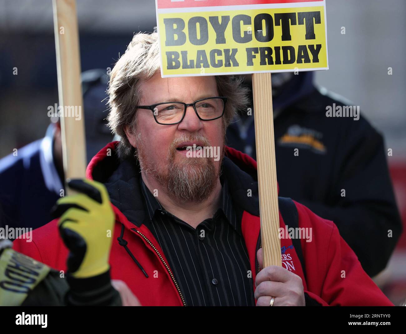 (171125) -- CHICAGO, Nov. 25, 2017 -- An activist participates in a protest in Chicago, the United States, on Nov. 24, 2017. Several dozens of activists staged a Black Friday protest and boycott stores in Chicago s busiest street for the third year in a row, to demand justice for minorities of police misconduct. ) (whw) U.S.-CHICAGO-PROTSET WangxPing PUBLICATIONxNOTxINxCHN Stock Photo