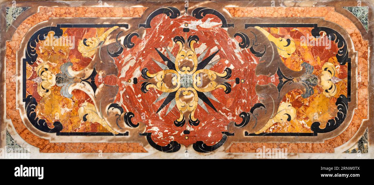 NAPLES, ITALY - APRIL 24, 2023: The baroque stone mosaic (pietra dura) in the church Chiesa di San Pietro Martire. Stock Photo