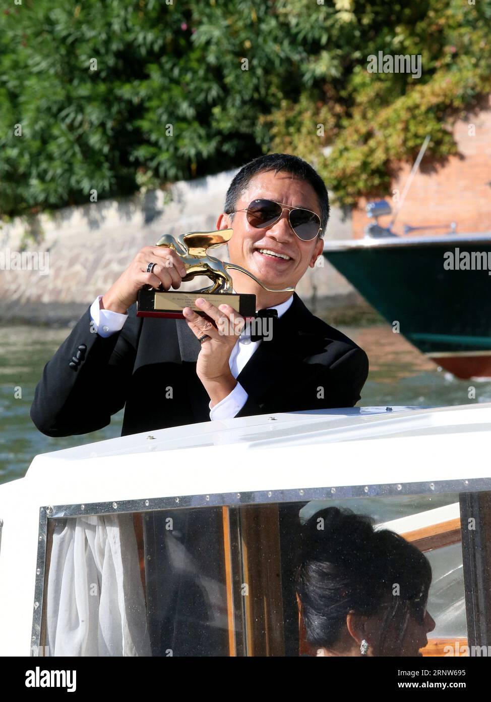 Venice, . 02nd Sep, 2023. Venice, 80th Venice Film Festival 2023. Day 4 - Arrivals at the Hotel Excelsior landing stage. In the photo Golden Lion Tony Leung Chiu Wai Credit: Independent Photo Agency/Alamy Live News Stock Photo
